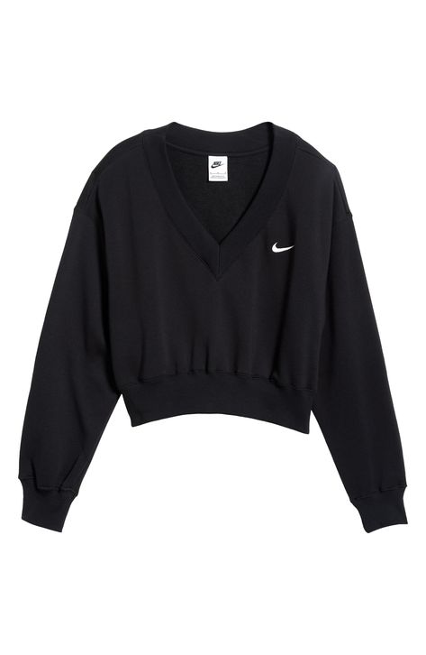 Minimally branded with an embroidered Swoosh, this classic sweatshirt is reimagined with a V-neck and cropped length. 19 1/2" length (size Medium) V-neck Ribbed cuffs and hem 80% cotton, 20% polyester Machine wash, tumble dry Imported Nike Spark, Nike Sportswear Phoenix Fleece, Creative T Shirt Design, Cute Nike Outfits, Nike Sweater, Comfy Sweatshirt, Sporty Outfits, Nike Outfits, Crop Sweatshirt