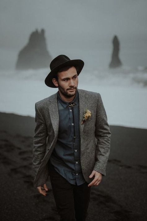 a relaxed groom's look with a grey jacket, a slate grey shirt, black pants, a black hat plus a bolo tie Groom Bohemian, Fall Groom, Moody Photos, Landscapes Beautiful, Groomsmen Poses, Strong Woman Tattoos, Adventurous Elopement, Beautiful Women Quotes, Iceland Elopement