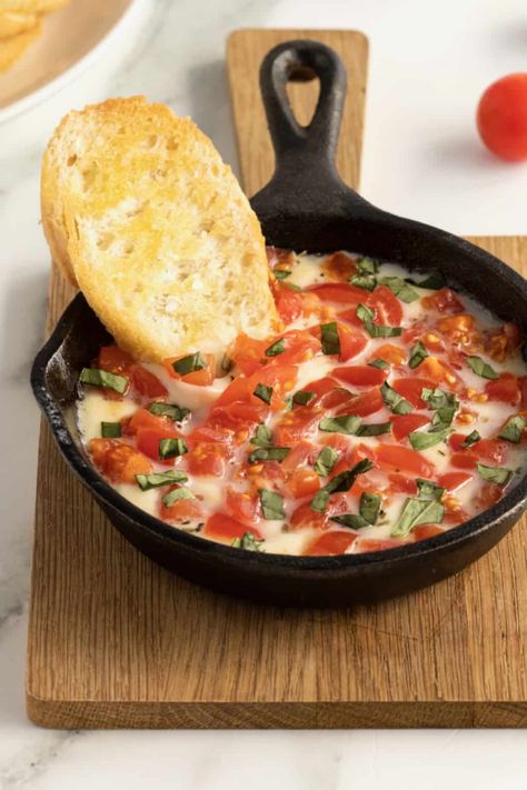 Skillet Caprese Dip - The BakerMama Caprese Dip, Baker Mama, Hot Apps, Marinated Cheese, Mozzarella Tomato, Toasted Crostini, Awesome Appetizers, Party Dip Recipes, Delicious Dips Recipes