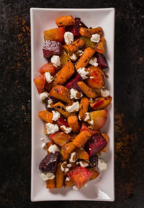 Roasted beets and carrots with goat cheese. This dish is brightened by a balsamic glaze to bring out the sweetness of the root vegetables. Carrots With Goat Cheese, Beets And Carrots, Roasted Beets And Carrots, Crumbled Goat Cheese, Balsamic Glaze Recipes, Beet And Goat Cheese, Roasted Root Vegetables, Eat Veggies, Goat Cheese Salad