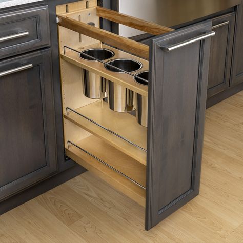 It can be tough to find the right spot that keeps your kitchen utensils organized, yet easily accessible. That's where our Base Pull-Out customization comes in! With its adjustable shelving and spacious utensil bins, your kitchen essentials can be tidily tucked away while also being within reach when you need them. #bertch #bertchcabinets #cabinets #utensildrawer #kitchenstorage #storagehack #storageideas Utensil Holder For Cabinet, Kitchen Utensils Organization, Organizing Ideas Kitchen, Utensil Cabinet, Pantry Organizing Ideas, Kitchen Pull Out Drawers, Utensils Drawer, Kitchens Storage, Bertch Cabinets