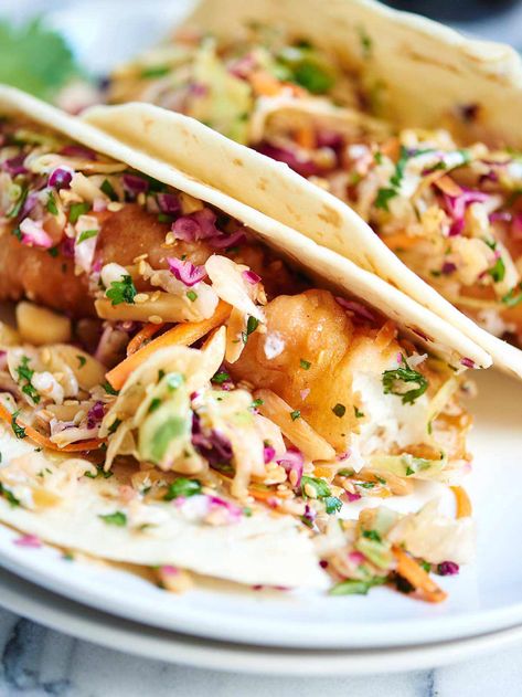 Beer Battered Fish Tacos - Fried Cod Tacos w/ Asian Slaw Fried Cod Fish Tacos, Tacos Fried, Fresh Coleslaw, Cod Tacos, Fried Cod Fish, Seafood Tacos, Cod Fish Tacos, Fish Tacos With Cabbage, Fried Fish Tacos