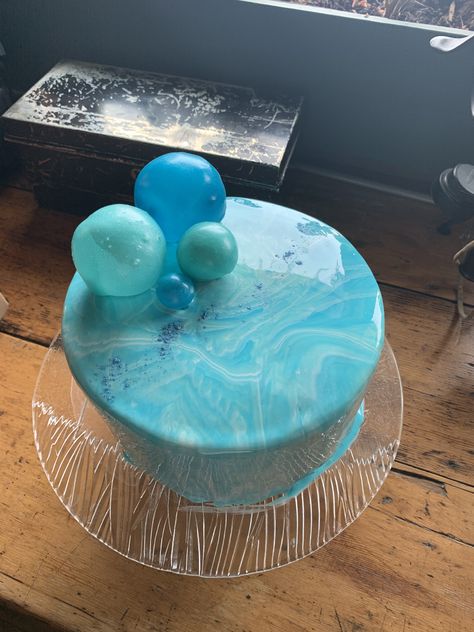 Chocolate cake with buttercream crumb coat, mirror glaze finish with gelatine bubble and glitter dust accents. Ocean Mirror, Chocolate Cake With Buttercream, Crumb Coat, Glaze Cake, Cake With Buttercream, Mirror Glaze Cake, Mirror Glaze, Glitter Dust, Birthday Cakes