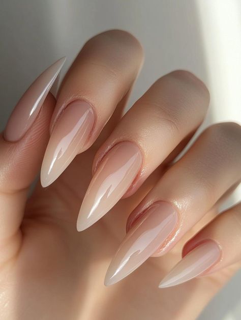 Discover the versatility of almond nails with our stunning array of 22 unique designs. This sophisticated shape combines the best features of oval and stiletto styles, creating a timeless look that's both elegant and edgy. Let your nails become a reflection of your personality with these flattering almond canvases. Stiletto Vs Almond Nails, Dope Nails Almond, Almond Nail Trends, Edgy Nail Designs, Glitter Almond Nails, Oval Shaped Nails, Glitter Accent Nails, Minimalist Inspiration, Faux Locs Hairstyles