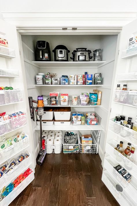 An organized white pantry with an Efla Door Rack on each door Over The Door Pantry Storage, Double Door Pantry Organization, Reach In Pantry Design, Reach In Pantry, Elfa Pantry, Pantry Door Organization, Pantry Door Storage, Pantry Door Organizer, Door Rack