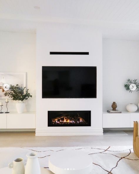 25 Practical Yet Beautiful Electric Fireplace With TV Above Ideas Electric Fireplace Decor, Tv Above Fireplace, Electric Fireplace Living Room, Tv Over Fireplace, Electric Fireplace Wall, Gorgeous Fireplaces, Three Birds Renovations, Fireplace Tv Wall, Wall Mount Electric Fireplace