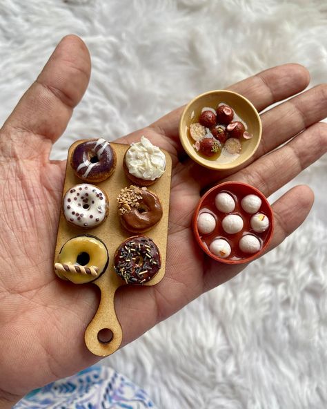 Anyone here has a sweet tooth? Miniature Donuts, Miniature Rasgullas, Miniature Gulabjamun available as miniature food magnets on my website www.smallidea.in. They are made out of polymer clay (Miniature Food Magnets, PolymerClay Miniatures, Miniature Donut, Miniature Gulabjamun, Miniature Rasgullas) Food Magnets, Clay Miniature Food, Clay Items, Polymer Clay Miniature, Polymer Clay Miniatures, Clay Miniatures, Miniature Food, Making Out, Donuts