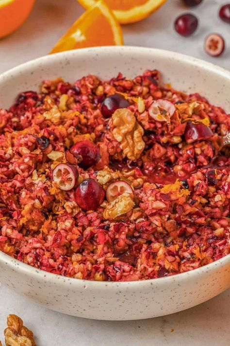 Skip the homemade cranberry sauce and make up this jazzed-up cranberry orange relish instead! This easy holiday side dish combines fresh cranberries, citrusy oranges, crunchy walnuts, and warm spices and is so quick and simple that it can be made ahead of time or at the last minute! It also wonderful as an appetizer on holiday charcuterie boards with baked brie or cream cheese on crackers. Cranberries With Orange, Cranberry Orange Relish Recipes, To Simply Inspire, Cranberry Orange Relish, Holiday Charcuterie, Easy Holiday Side Dishes, Relish Recipe, Homemade Cranberry Sauce, Holiday Side Dish