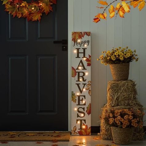 Features sentiment that reads Happy Harvest, colorful finish and fall leaves motif. Block combines a rustic backdrop with colorful embellishments and themed icons. Greet guests and passersby with a message of seasonal cheer with fall leaves and Havest porch sign. The design can be enjoyed as is during the day and then again at night when it's illuminated. Harvest Porches, Outdoor Fall Decor Ideas, Outdoor Fall Decor, Themed Icons, Fall Front Porch Decor Ideas, Front Porch Decor Ideas, Happy Harvest, Rustic Backdrop, Wooden Porch