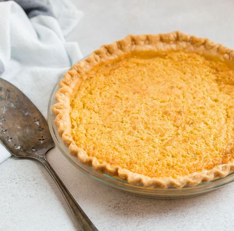 This easy homemade Buttermilk Pie is made with simple ingredients and a touch of bourbon! You'll love this spin on the classic Southern recipe! Old Fashioned Coconut Custard Pie Recipe, Best Coconut Custard Pie Recipe, Best Buttermilk Pie, Coconut Custard Pie Recipe, Buttermilk Pie Recipe, Coconut Pie Recipe, Make Buttermilk, Custard Pie Recipe, Coconut Cream Pie Recipes