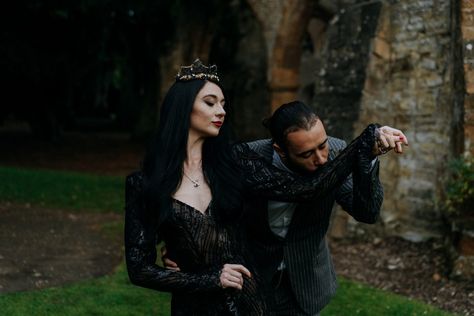 Adams Family Engagement Photos, Addams Family Inspired Photo Shoot, Gomez And Morticia Photo Shoot, Morticia And Gomez Wedding Theme, Halloween Wedding Party Attire, Gothic Wedding Poses, Morticia And Gomez Engagement Photos, Morticia And Gomez Addams Photoshoot, Goth Wedding Photo Ideas