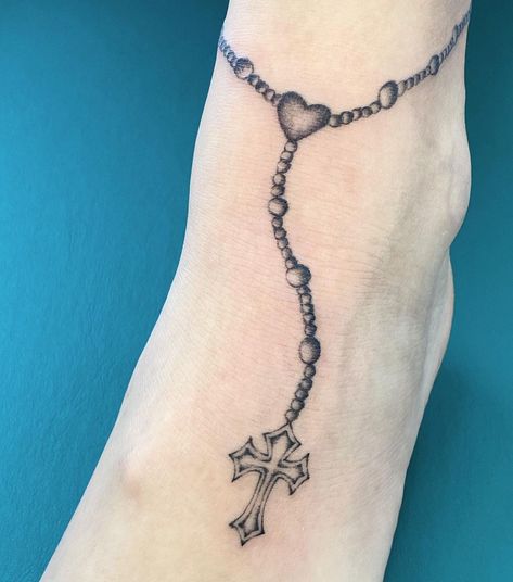 🦉 rita on Instagram: “Rosary wrapping around Mckenna's ankle 📿 thank you! :-)” Delicate Rosary Tattoo, Ankle Rosary Tattoo, Red Rosary Tattoo, Ankle Tattoo Wrap Around, Ankle Wrap Around Tattoo, Ankle Cross Tattoo, Rosary Tattoo On Ankle, Rosary Ankle Tattoos, Ankle Tattoo Cross