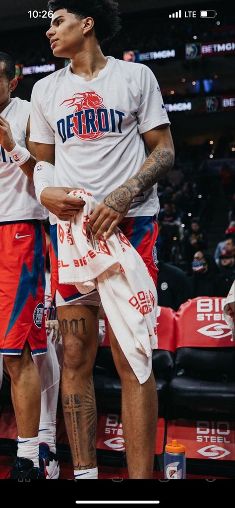 Cool Small Leg Tattoos For Men, Nba Leg Tattoos, Nba Tattoos Basketball Players, Word Leg Tattoos Men, Leg Tattoos For Guys Ideas, Devin Haney Leg Tattoo, Hooper Tattoo Ideas, Simple Leg Tattoo Men, Back Calf Tattoos Men