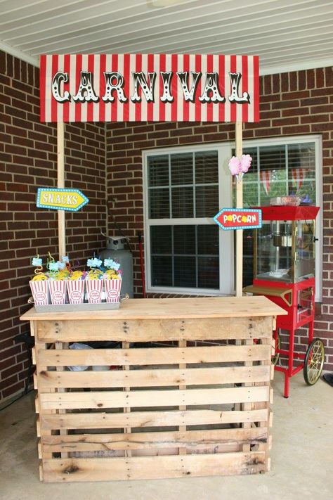 Carnival birthday party stand- popcorn and cotton candy, lemonade. Made from pallets. Pallet Carnival Booth, Fall Fair Birthday Party, Carnival Popcorn Stand, Carnival Stands Diy Booth Ideas, Diy Carnival Fun House, Carnival Birthday Party Decorations Diy, Carnival Bday Party Ideas, Diy Popcorn Stand, Fall Carnival Birthday Party