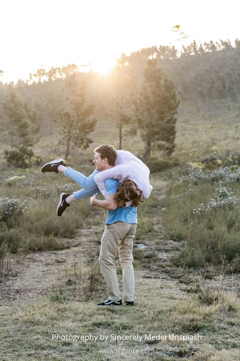 Carry Her In His Arms, Carried Over Shoulder Couple, Carrying Over Shoulder Pose Reference, Boyfriend Carrying Girlfriend Over Shoulder, Carrying Girlfriend Over Shoulder, Shoulder Carry Pose Reference, Bride Carry Pose Reference, Over The Shoulder Carry Pose, Types Of Carrying People