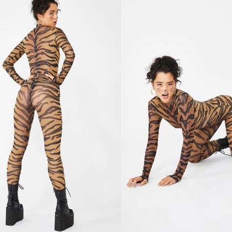 Description Trickz N' Treatz Bad Bish Anthem Tiger Catsuit Cuz You Are The Realest In The City! You're Dripped Up N' Wiped Down In This Top Charted Long Sleeve Catsuit That Has A Sheer Mesh Construction, Top Notch Bish Tiger Print All Ova, High Neckline N' Back Zip Closure. Details Our Doll Wears S And Is 5'5 Light Brown 94% Polyester 6% Spandex Machine Washable New With Catsuit Outfit, Mesh Jumpsuit, Tiger Print, Catsuit, High Neckline, Dolls Kill, Light Brown, Pant Jumpsuit, Jumpsuit Romper