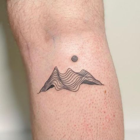 Elevate your style with mountain tattoos. In this article, we will share the best designs from geometric lines to realistic depictions. Abstract Square Tattoo, Mountains Tattoo Minimalist, Mountain Tattoo Abstract, Simple Abstract Tattoos, Mountain Hand Tattoo, Fine Line Landscape Tattoo, Tattoo On Back Of Arm Above Elbow, Topographic Tattoo, Mountain Minimalist Tattoo