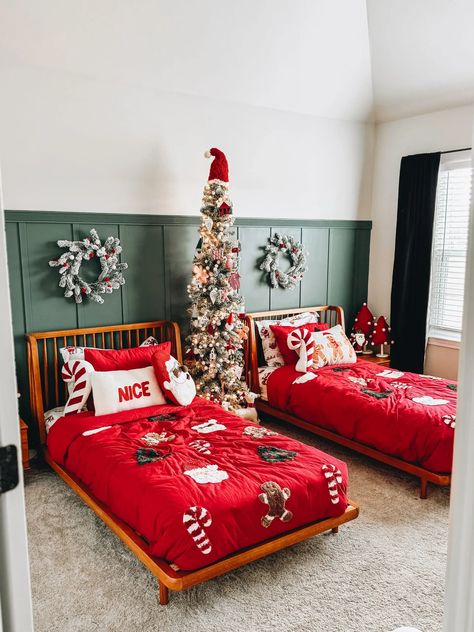 "Revamped this room, and it's a hit! Check out the viral mini tour on Instagram & TikTok. From the chaos of the boys’ Spooky Room to the stylish 'Grand Prix' accent wall by Sherwin Williams, it's been a journey. The decor is a mix of old and new, with Santa sheets lasting 5 Christmases! Linked everything below, including pillows from past seasons and stores like HomeGoods. Dive into the cozy vibes! #RoomTransformation #HomeDecor #CozyLiving" Spooky Room, Christmas Kids Room, School Supply Storage, Holiday Bedroom, Christmas Tree Light, Holiday Room, Under The Christmas Tree, Tree Light, Christmas Bedroom