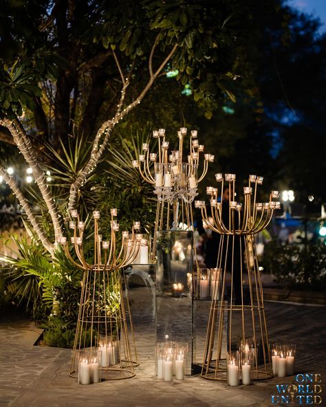 We recreated a mini paradise for the #Phera ceremony where every corner echoed a tale of surreal romanticism and delicate blossoms filled the air with their serene scents. Decor & design: @oneworldunited.in Wedding planner: @unavida_weddings Wedding venue: @alilafortbishangarh Florals: @diamondflorist_jaipur Props & Candles: @shinecollectionbydeepaksharma Furniture: @silverline_rentals 📞 097995 35809 📩 oneworldunitedoffice@gmail.com #wedding #weddingdecor #eventmanagement #decor #ind... Diwali Event Decor, Floral Stage Design, Surreal Romanticism, Cocktail Event Decor, Phera Mandap Decor, Wedding Cocktail Decor, Diwali Props, Sufi Night Decor, Candle Reception Decor