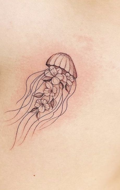 Tattoo Ideas Female Jellyfish, Red Jellyfish Tattoo, Fine Line Jellyfish Tattoo, Jellyfish Flower Tattoo, Jelly Fish Tattoos, Puffer Fish Tattoo, Small Jellyfish Tattoo, Jellyfish Tattoo Minimalist, Rib Tattoo Placements