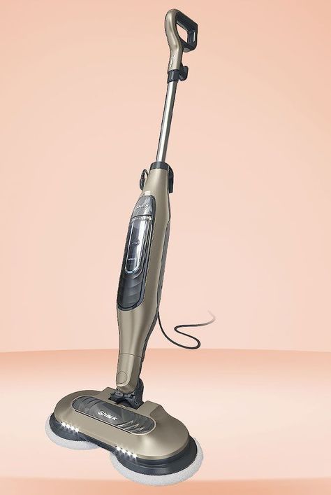 The Shark Steam and Scrub mop is on sale for $130 at Amazon. The two-in-one cleaning gadget scrubs and steams floors free of bacteria, dirt, and stains without using any harsh chemicals. Plus, it can be used on a variety of floors including hardwood, tile, grout, and more. #cleaning #amazonfinds #vacuum #onsale Shark Steam Mop, Clean Hardwood Floors, Steam Mops, Steam Mop, Cleaning Gadgets, Hardwood Tile, Best Vacuum, Mop Pads, Tile Grout