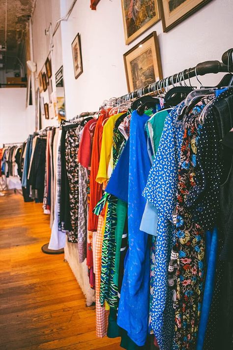 Racks of colorful dresses at Housing Works, one of the popular second hand stores where you can shop for affordable clothes in New York City! #NYC #NewYorkCity #Thrift #Shopping Thrift Shop Aesthetic, Best Places In New York, Nyc Budget, Stores In New York, Thrift Store Outfits, New York City Vacation, Best Places To Shop, Places In New York, Places To Shop