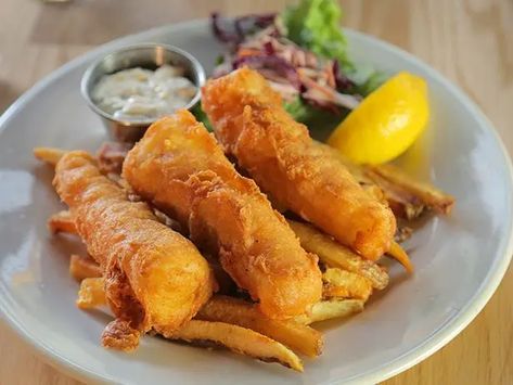 Get Fish and Chips Recipe from Food Network Fish Fingers And Chips, Fish N Chips Recipe, Fish Finger, Seafood Seasoning, Tartar Sauce, Beer Batter, Chips Recipe, Lemon Slice, Pancake Batter