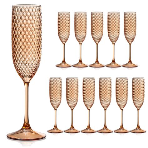 PRICES MAY VARY. 1.Enter a world of luxury and style with our Gatsby-style glasses. Immerse yourself in the charm of the olden days and enjoy your favorite wine in these exquisite vessels. Let's go back to the 1920's party! 2. Sufficient Quantity:You will have a sufficient supply of Champagne Glasses for a medium-sized party, event, or family celebration. This ensures that all your guests can enjoy a good drink without having to worry about the cups running out quickly. 3. Elegant Design: Our wi Boho Champagne Glasses, Champagne Theme Birthday Party, Gold Goblet, Bridesmaid Champagne Glasses, Fancy Wine Glasses, Birch Christmas, Champagne Decor, 1920's Party, Plastic Champagne Glasses