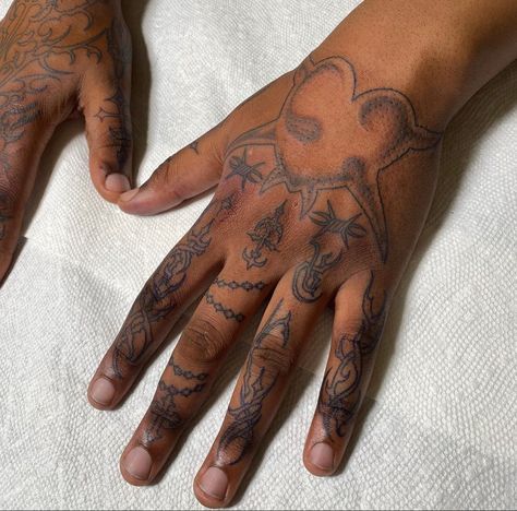 Dark Skin Hand Tattoo, Hand Tats Men Black, Tattoo Ideas Brown Skin, Grinch Tattoo, Tattoos On Dark Skin, Black People Tattoos, Dark Skin Tattoo, Black Men Tattoos, Sigil Tattoo