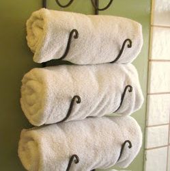 5 Stylish Ways To Utilize Wine Racks Gift Ideas For My Sister, Wine Racks Ideas, Wine Rack Towel Holder, Wine Rack For Towels, Wine Rack Uses, Bathroom Storage Tower, Travel Trailer Organization, Ikea Spice Rack, Toilet Shelves