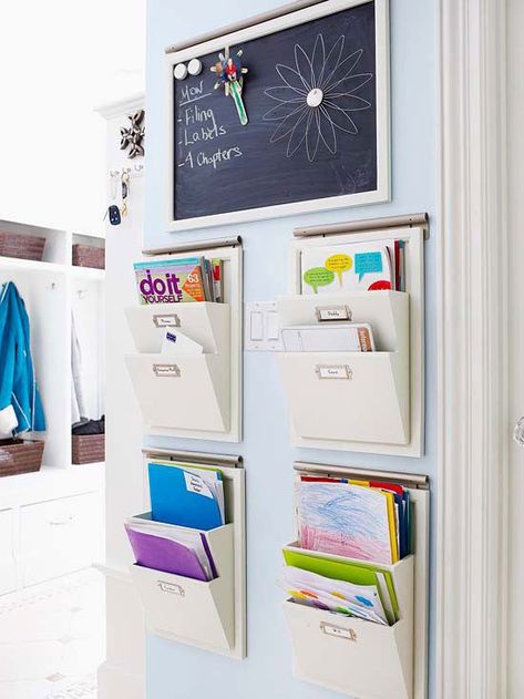 Wall mounted pockets for each family member keep mail, homework, and other papers organized and all in one place. Family Command Centers, Wall File Holder, Command Center Kitchen, Office Hacks, Office Organisation, Wall File, Family Command Center, Kitchen Desks, Diy Office