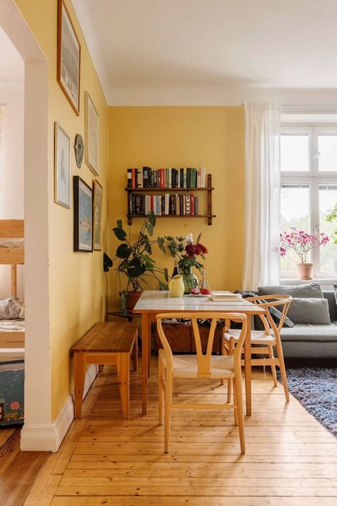 Yellow Wall Apartment, Yellow Front Room, Yellow Floor Living Room, Dining Room Decor Colorful, Yellow Playroom Walls, Butter Yellow Living Room, Living Room With Breakfast Nook, Apartment Ideas Colorful, Yellow Wall Aesthetic