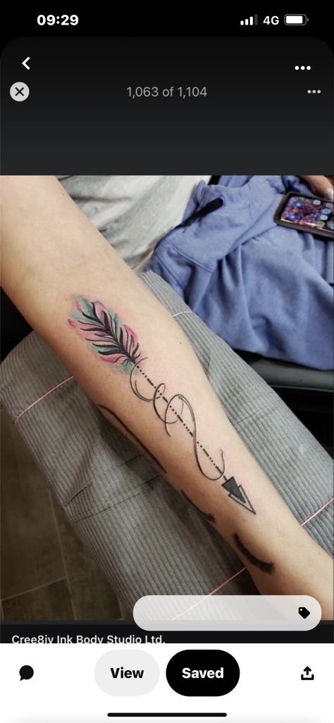 Saggitarius Arrow Tattoos For Women, Warrior Feather Tattoo, Arrow Wrap Around Tattoo, Tattoo Ideas Female Arrow, Unique Arrow Tattoos For Women, Colorful Arrow Tattoos For Women, Colorful Arrow Tattoo, Boho Arrow Tattoos For Women Forearm, Watercolor Arrow Tattoos For Women