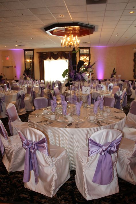 Ivory and Lavender Wedding Reception! Lavender Wedding Reception Tables, Lavender And Sage Reception, Lilac And Ivory Wedding Decor, Lavender Gold And White Wedding Table Settings, Lavender Wedding Reception, Reception Stage Decor Lavender, Lavender Wedding Theme, Grey Lavender, Quinceanera Dresses Blue