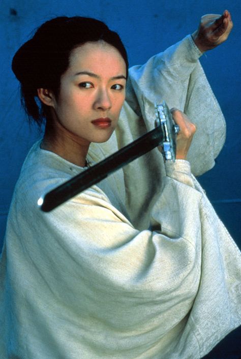 Jen, the protagonist of the film "Crouching Tiger, Hidden Dragon" (2000), is a fierce, stubborn sword-wielder who eschews an arranged marriage for her true love. Crouching Tiger Hidden Dragon, Hidden Dragon, Shu Qi, Martial Arts Film, Crouching Tiger, Ang Lee, Martial Arts Movies, Zhang Ziyi, Tai Chi Chuan