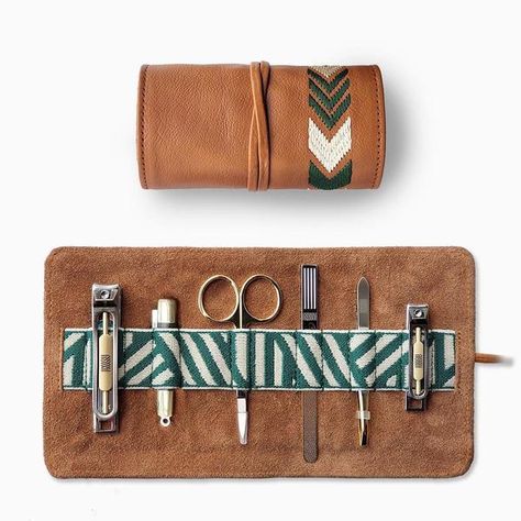 The all-in-one Mantidy Grooming Roll 6 piece manicure set is the perfect gift for the perfectly groomed man. Ideal for travelling. FEATURES: Full-grain aniline-dyed cowhide leather 6 carbon steel tools in silver, gun metal and brass designs Full-grain cowhide leather 100% Genuine and Vegetable Tanned Ethically produced DIMENSIONS: Unrolled: L9”(23cm) x W4.5”(11.5cm); Rolled: L2.5”(6cm) x W2.5”(6cm) x H4.5”(11.5cm) Box Size: L5.5”(14cm) x W3.2”(8cm) x H2.3”(6cm) Weight: 185g. Proof of age and a s Mens Manicure, Nail Scissors, Mens Travel, Personalized Gifts For Men, Leather Roll, Manicure Kit, Manicure Set, Best Gifts For Men, Leather Projects