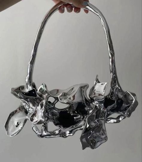 Liquid fashion, futuristic fashion, silver aesthetic, bag inspo, subversive style, outfit ideas Silver Futuristic Aesthetic, Futuristic Purse, Futuristic Fashion Design, Metallic Futuristic, Futuristic Accessories, Futuristic Jewelry, Y2k Fashion Aesthetic, Body Decoration, Futuristic Aesthetic