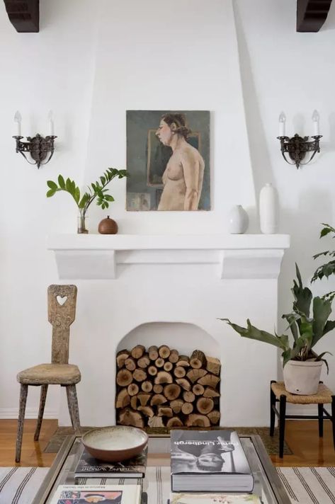 A nonfunctional fireplace that's been filled with stacked firewood logs Empty Fireplace Ideas, Inexpensive Decor, White Fireplace, Faux Fireplace, Eclectic Living Room, Lounge Design, Art Deco Home, Fireplace Ideas, Studio Mcgee