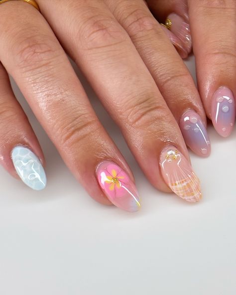 summer freestyle for maddie 🌺🫧🐚 i’m actually so in love with how this set turned out omg and it was so fun to make the water nail likeeee look how realistic?? love. #nails #nailart #summernails #summer #gelx #gel #gelnails #vbeautypure #apresgelx #après #vbp #nailinspo #nailinspiration #gelextensions #almondnails Jelly Nails Designs, Bali Nails, Hoco Nails, August Nails, Water Nails, Cute Nail Art Designs, Edgy Nails, Summery Nails, Cute Gel Nails