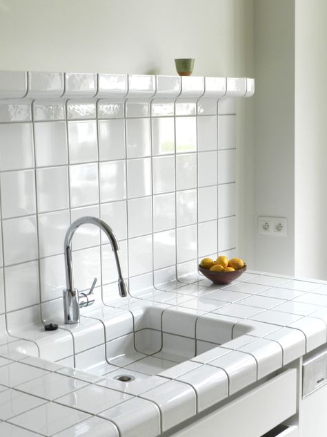 D-tile is a system which allows any space or object to be completely covered with tiles. This is possible because the D-tile collection consists of flat-, construction-, and function-tiles. The quality of all D-tile products, frost resistant stoneware, ensures that it is applicable everywhere and under all circumstances. And where... White Tiles, Kitchen Tiles, Cheap Home Decor, 인테리어 디자인, Interior Design Kitchen, A Kitchen, Bathroom Interior, Kitchen Inspirations, Kitchen Interior