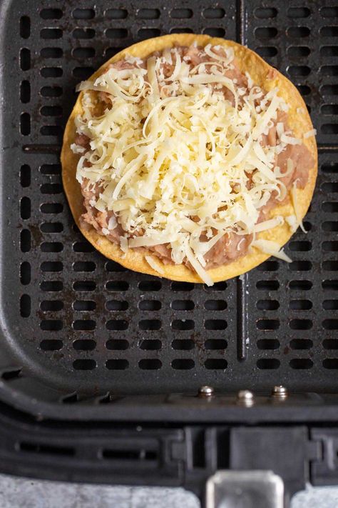 Air fryer tostadas are crispy and delicious. These tostada shells are easy to make in the air fryer and can be topped with a variety of tasty toppings. Tostada Shells In Air Fryer, Air Fryer Tostadas, Tostada Shells, Tostada Recipes, Pampered Chef, Fryer Recipes, Air Fryer Recipes, Air Fryer, Shells