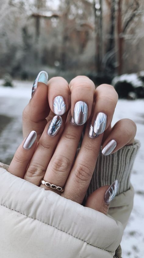 Get the ultimate winter nail transformation with frosted chrome designs! These shimmering metallics are ideal for adding a touch of elegance to any outfit. Whether you're sipping hot cocoa or attending a festive event, these nails are sure to make a statement. #FrostedChromeNails #WinterNailGoals #MetallicElegance #IcyNails #NailDesignIdeas Winter Chrome Nails, Frosted Nails, Chrome French Tips, Nails For Winter, Nail Transformation, Chrome French, Chrome Designs, Chrome Nail Art, Winter Nail