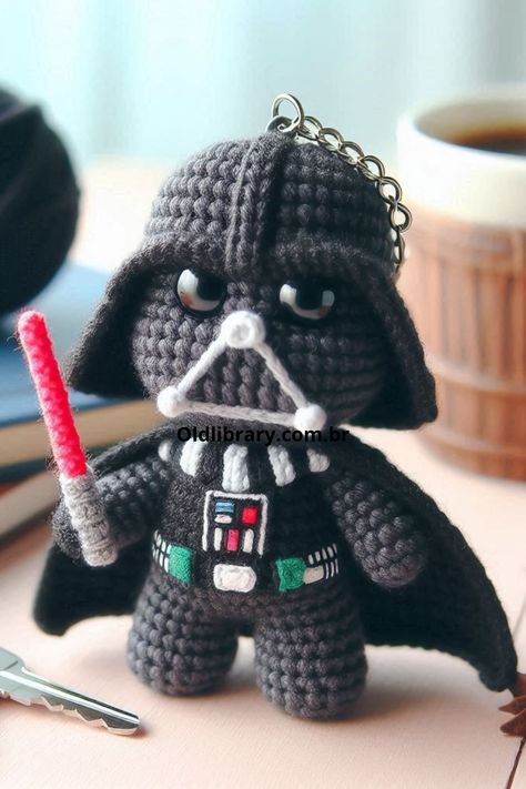 Create your own amigurumi dark side character with this detailed crochet pattern, featuring a helmet, cape, and lightsaber Darth Vader Crochet Pattern Free, Crochet Lightsaber, Star Wars Crochet Patterns Free, Crochet Darth Vader, Amigurumi Starwars, Dark Vader, Star Wars Crochet, Detailed Crochet, Side Character