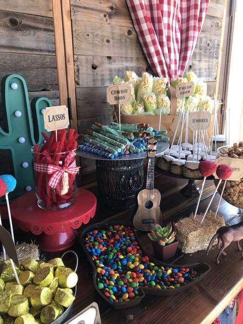 Samarie’s Wild West | CatchMyParty.com Stagecoach Themed Birthday, Outdoor Western Birthday Party, Western Sweets Table, Buckaroo Turning 2, Western Theme Birthday Party Boy, Western Party Snack Ideas, Western Party Dessert Table, First Rodeo Snack Table, Western Theme One Year Old Party