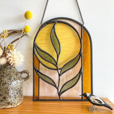 Stained Glass Art on Instagram: "I love this little still life of this sweet piece inspired by the shapes and colours of the Aussie bush! My @sabceramics vase and @donna.saunders.ceramics magpie are bringing the right vibes 💕 . . . . #australianartist #magpie #eucalyptus #stainedglass #stainedglassart #glassart" Stained Glass Simple Ideas, Stained Glass Table Numbers, Stained Glass Design Ideas, Floral Stained Glass Patterns, Simple Stained Glass Designs, Stained Glass Art Diy, Art Deco Stained Glass Patterns, Easy Stained Glass Projects, Stained Glass Designs Templates