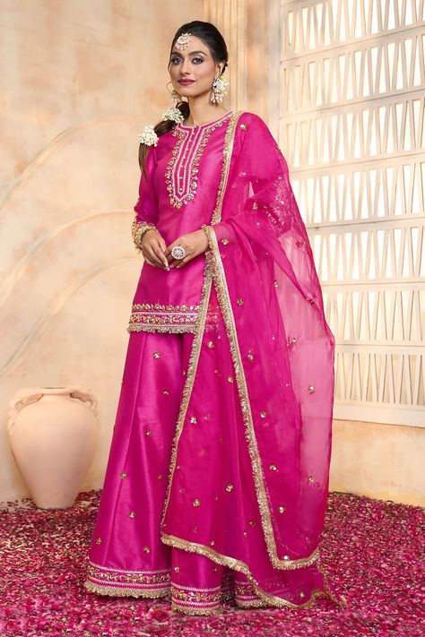 Shop for these amazing collections of Fuchsia Kurta And Sharara Dupion Embroidered Gota Round Floral Set For Women by Preeti S Kapoor online at Aza Fashions. Short Kurta With Skirt, Short Kurta Plazo Design, Banarasi Sharara Suits, Short Kurta With Plazo, Plazo With Short Kurti, Suit With Lace Design, Elegant Royal Dresses, Garara Design, Colorful Style Outfits