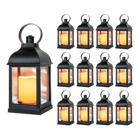 PRICES MAY VARY. 12 PIECE SET 10" DECORATIVE LANTERNS with Flameless LED Lighted Candle, 5HR Timer, Weather Resistant - Decorative Outdoor Lanterns - Black. Perfect for your home, garden, patio or weddings! VINTAGE DESIGN WITH RUSTIC CHARM - These classic lanterns are made with durable weatherproof plastic so you can use them outdoors and not have to worry about them rusting. The side panels are made of glass that helps create realistic lighting effect. Each Lantern features a Convenient Carry R Outdoor Wedding Lighting, Decorative Lanterns, Outdoor Lantern Lighting, String Lights Wedding, Small Lanterns, Lantern Candle Decor, Garden Weddings, Led Lantern, Garden Candles