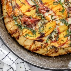 Summer Peach and Prosciutto Pizza with Balsamic Glaze Drizzle - The Seasoned Skillet Pizza With Balsamic Glaze, Peach Basil, Pizza Dough From Scratch, Basil Pizza, Basil Pesto Sauce, Prosciutto Pizza, Yummy Meals, Balsamic Reduction, Pizza Recipes Homemade