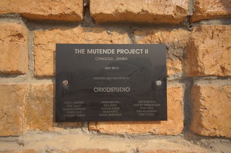 The Mutende Project is an overseas humanitarian design and build project funded by a Scottish charity, Orkidstudio.  They supported a local orphanage in Chingola, Zambia this year and had Stanley London laser engrave this commemorative plaque that was mounted on the side of the building. Commemorative Plaque, Plaque Design, Laser Engraving, Design