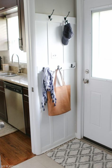 The back door entryway is just as functional as the front! Hooks abound for jackets, purses, scarves and hats. Batten Board, Creating An Entryway, Entryway Hooks, Room Storage Diy, Diy Playbook, Small Entryways, Door Entryway, Drop Zone, Casa Vintage